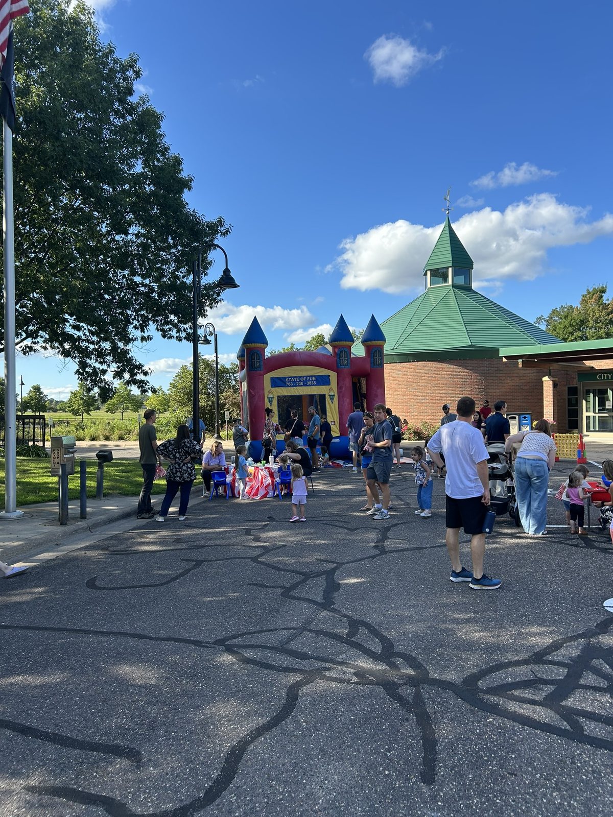 Families enjoying a State of Fun event outside a city facility