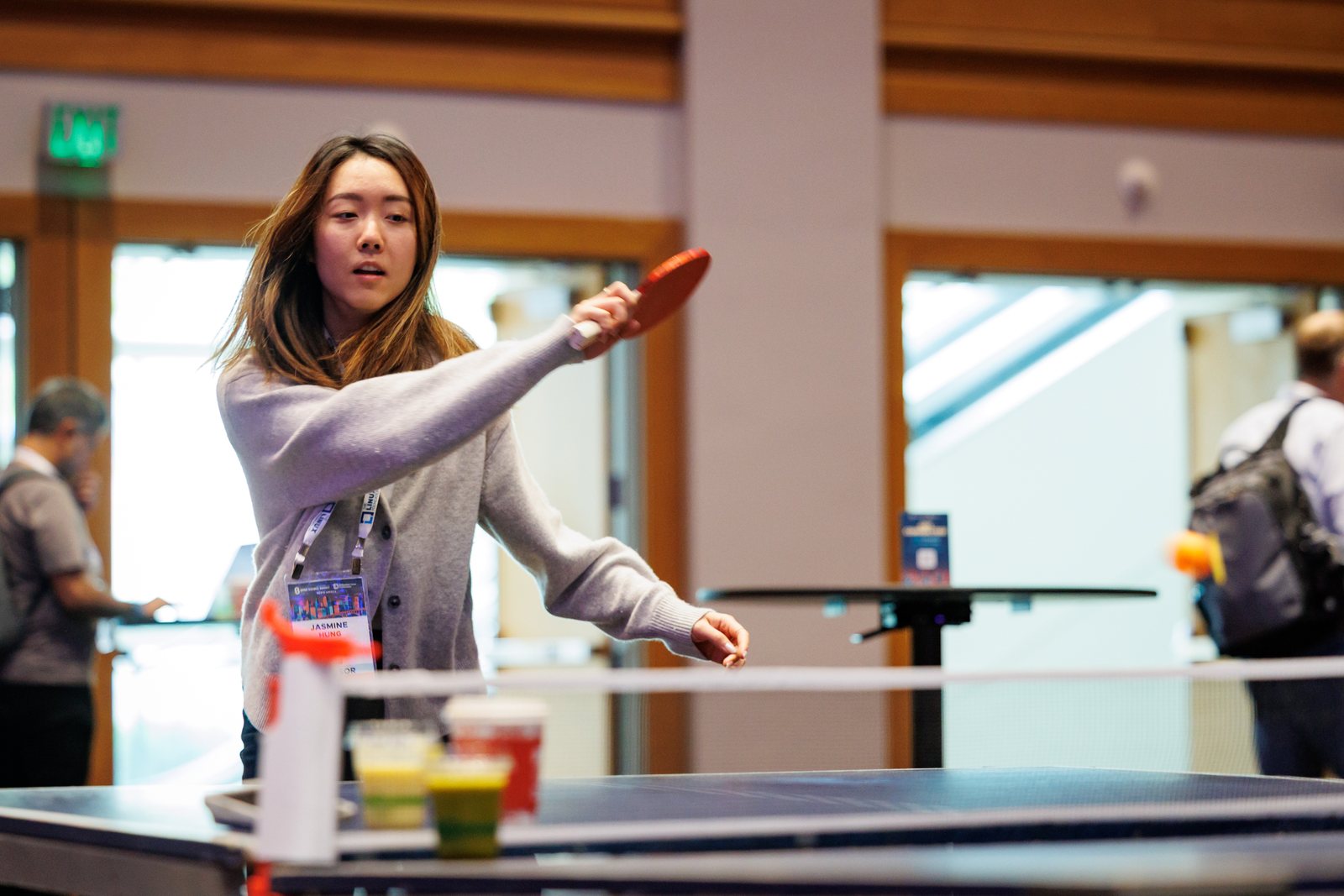 Corporate event attendee playing table tennis